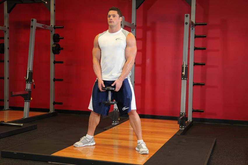 Plie Dumbbell Squat — start position