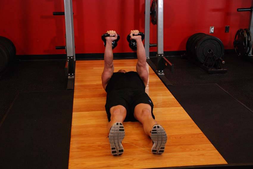 Alternating Floor Press — start position
