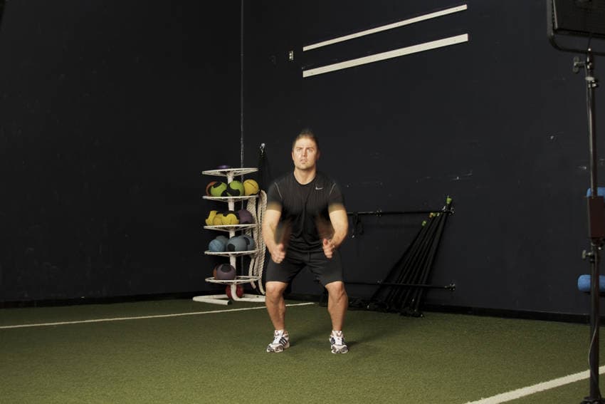 Double Leg Butt Kick — start position