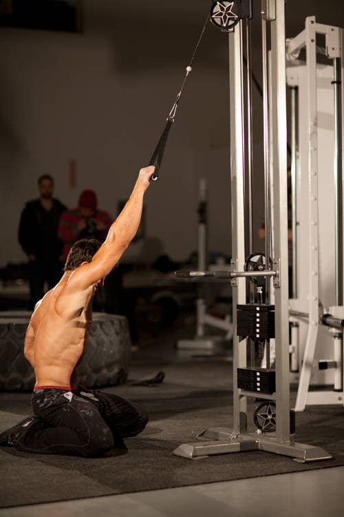 Kneeling Single-Arm High Pulley Row — start position