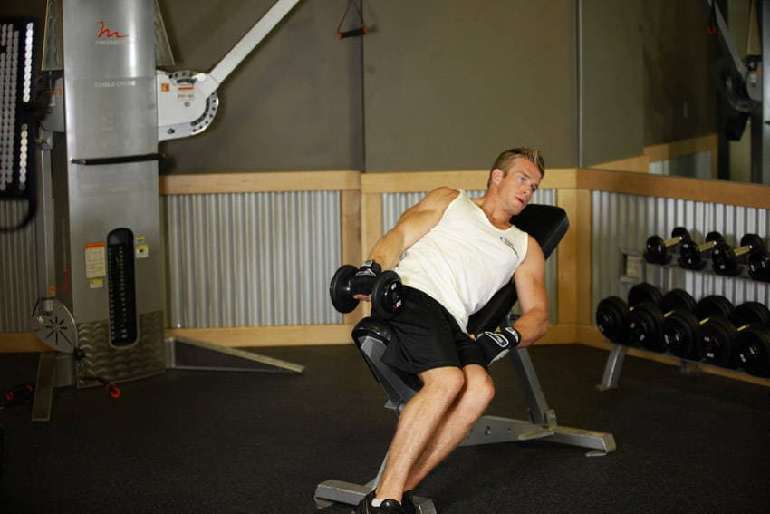One-Arm Incline Lateral Raise — start position