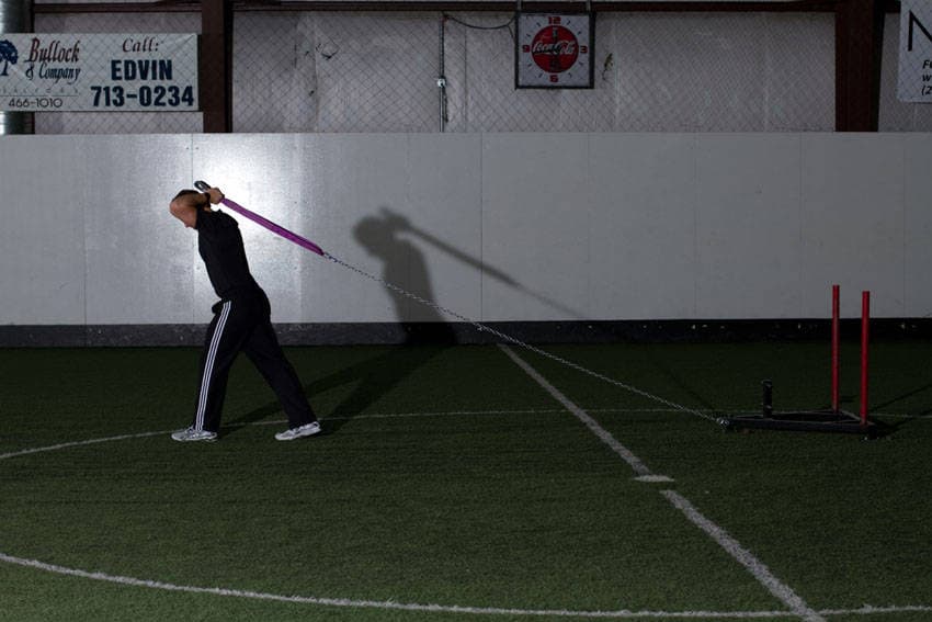 Sled Overhead Triceps Extension — start position