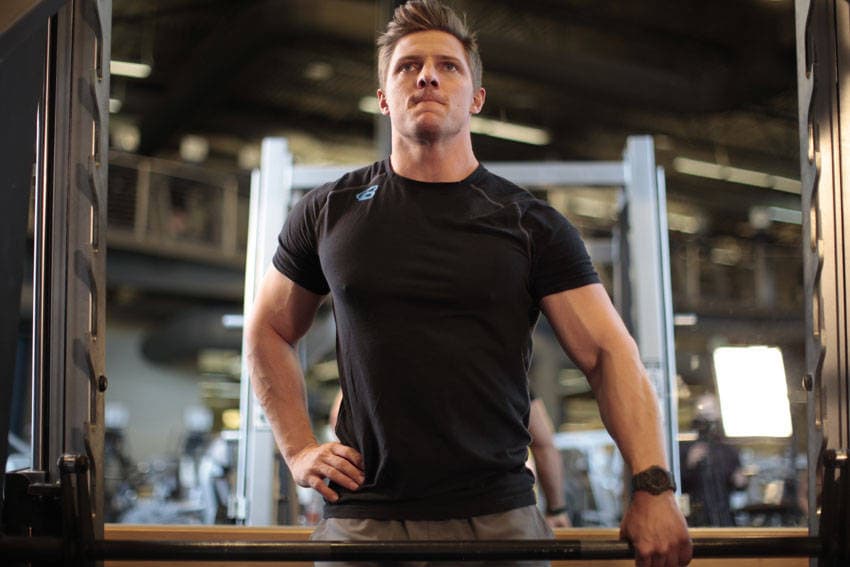 Smith Machine One-Arm Upright Row — start position