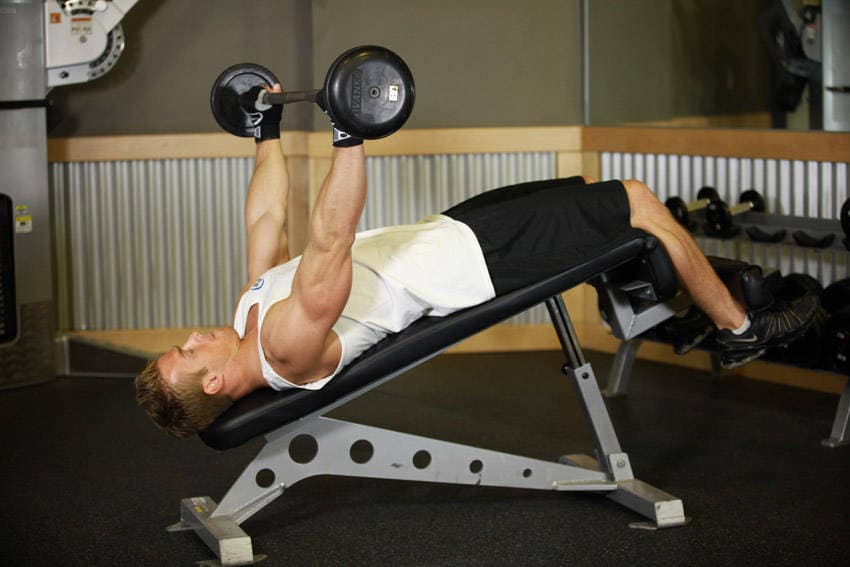 Wide-Grip Decline Barbell Pullover — start position